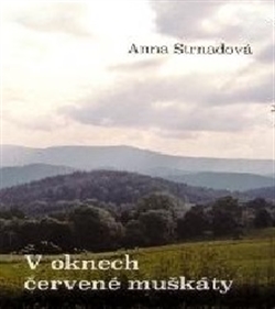 V oknech červené muškáty - 