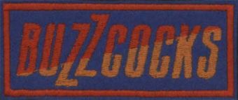 BUZZCOCKS - Oranžovo - červené logo na modrom podklade